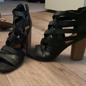 Strapping black open toed booties